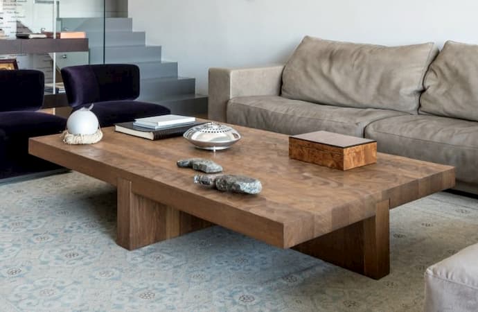 large wooden coffee table and sofa bed for living room