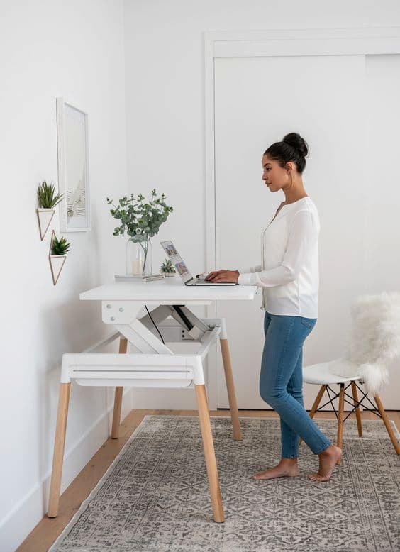 woman working on a stand up desk