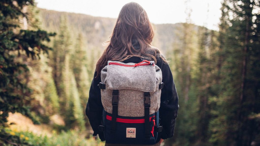 backpack for school girl in forest
