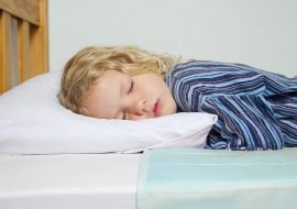 Bedwetting Solutions: TheraPEE Bedwetting Alarm vs. Brolly Sheet Bed Pad