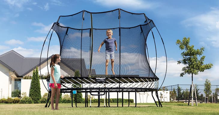Kid playing on trampoline
