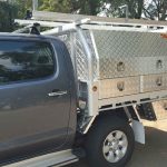 picture of an ute tray toolboxes on a road