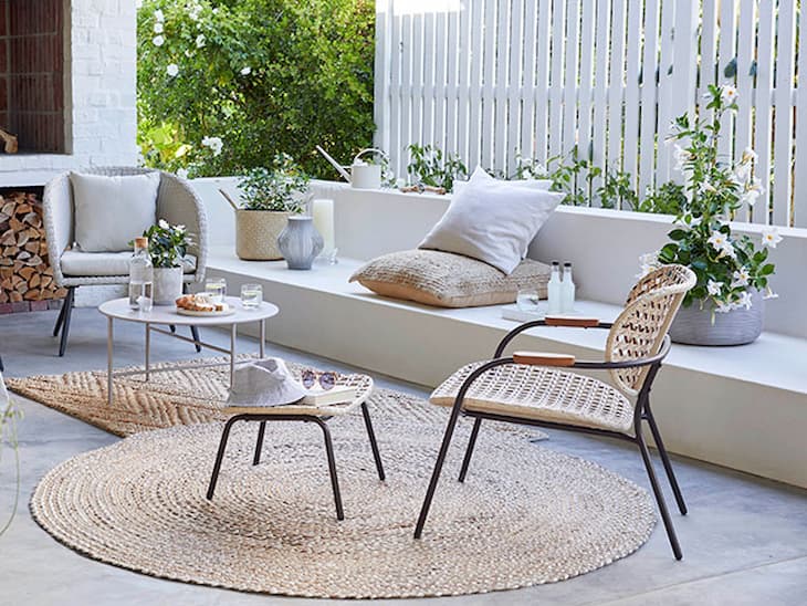 decorate your outdoor area is with a jute rug